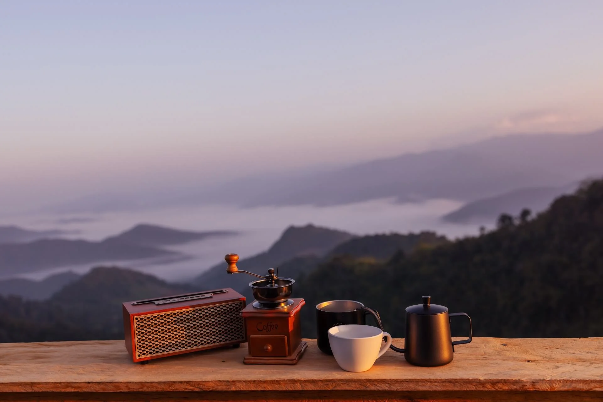 a serene mountain sunrise with a wooden table set 2025 02 15 23 38 44 utc